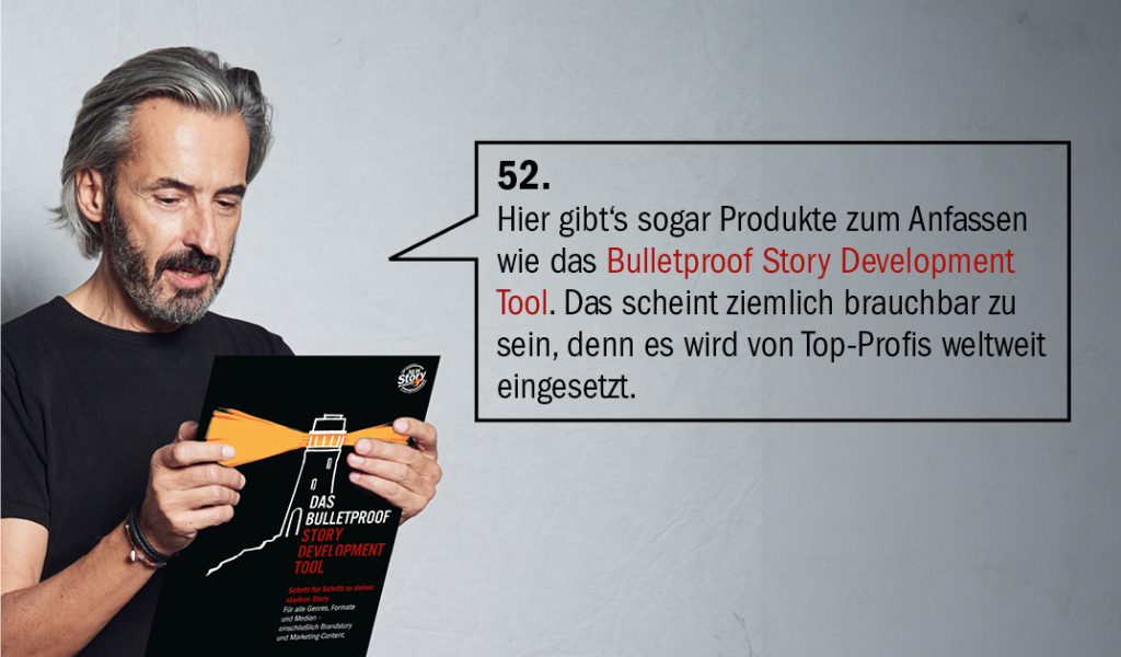 Markus Gull hält ein Heft mit der Aufschrift Bulletproof Story Development Tool in der Hand
